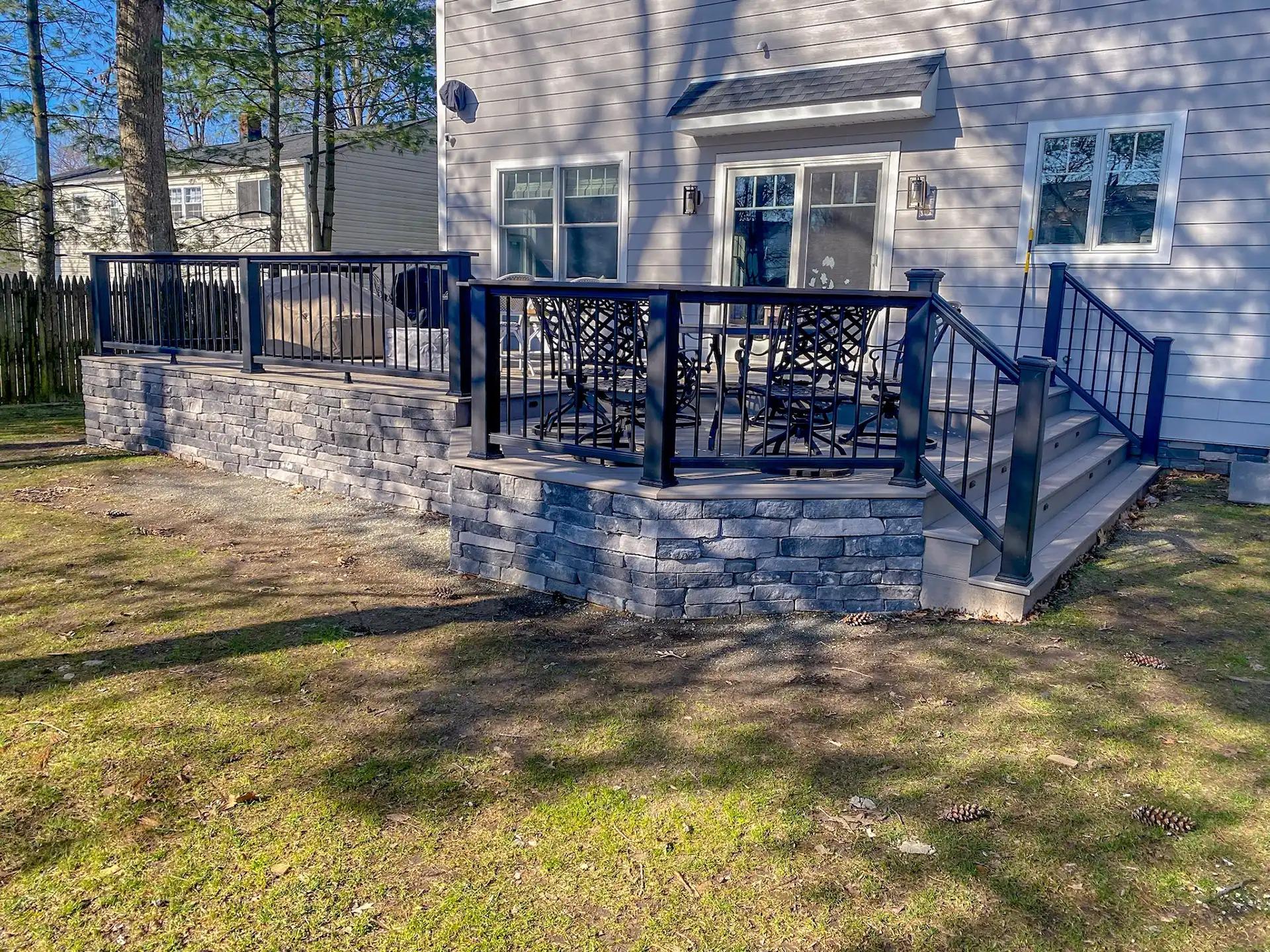 Custom deck with black railings built by Decks by Murray