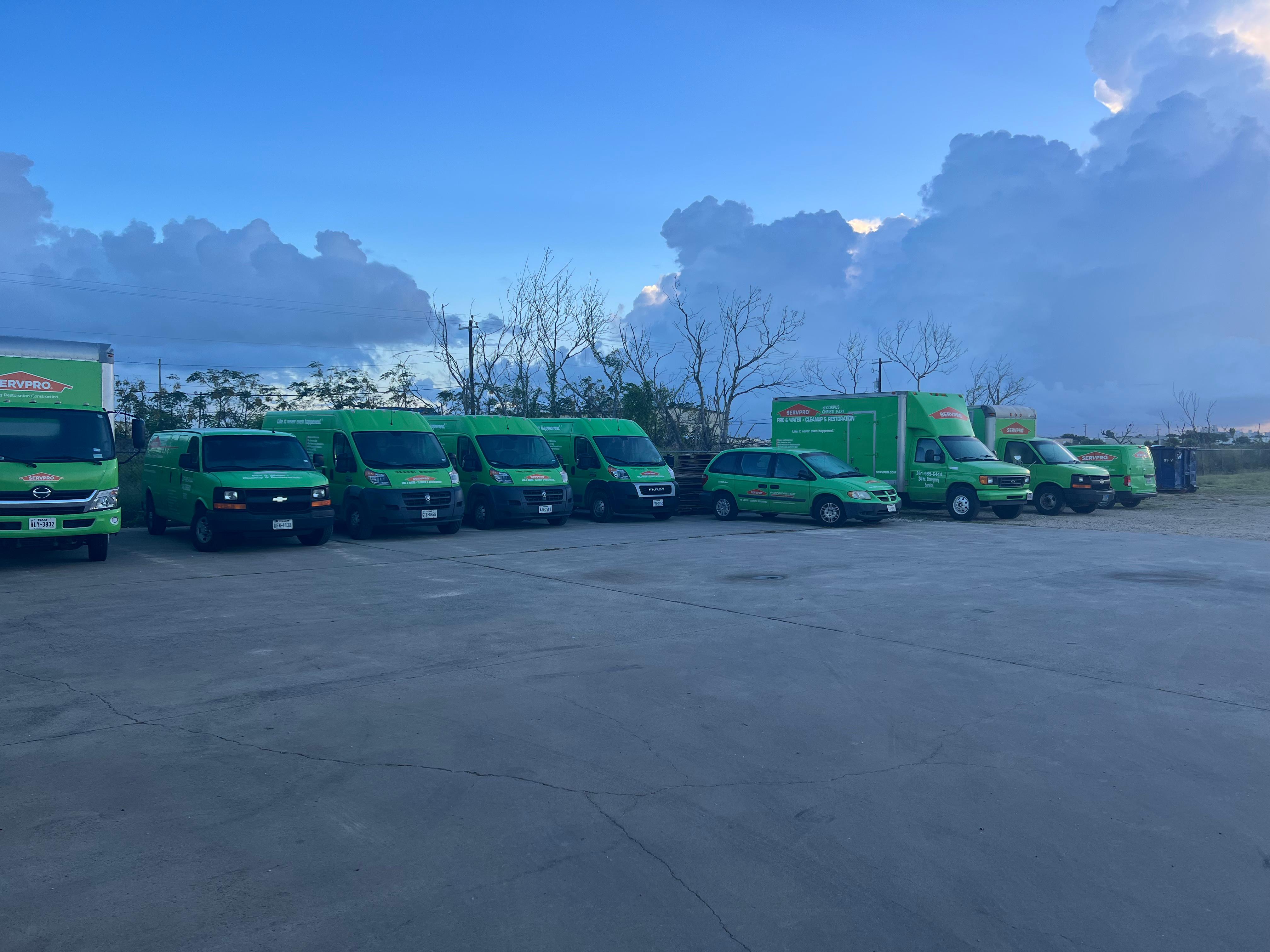 Some jobs are bigger than others.  A whole fleet of SERVPRO vehicles lined up at this job site.