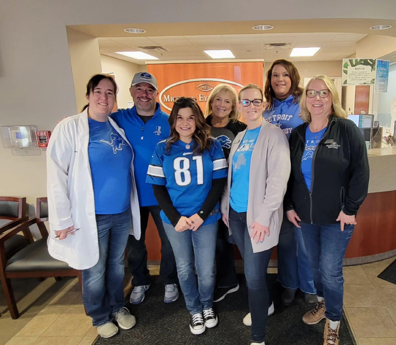 Michigan Eye Institute Employees Wearing Detroit Lions Attire