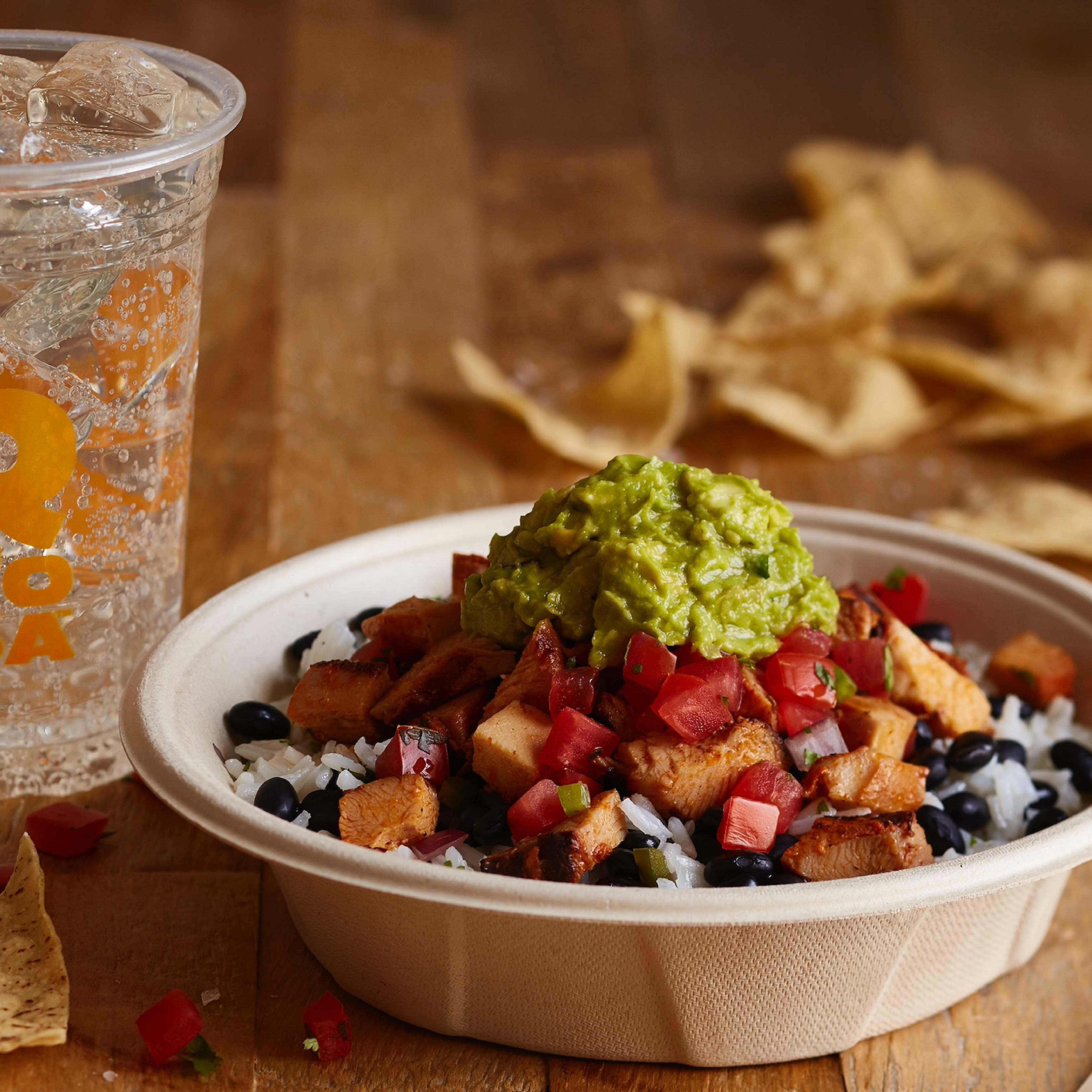 A burrito bowl topped with freshly grilled adobo chicken brings the flavor! QDOBA Mexican Eats Indianapolis (317)423-3932