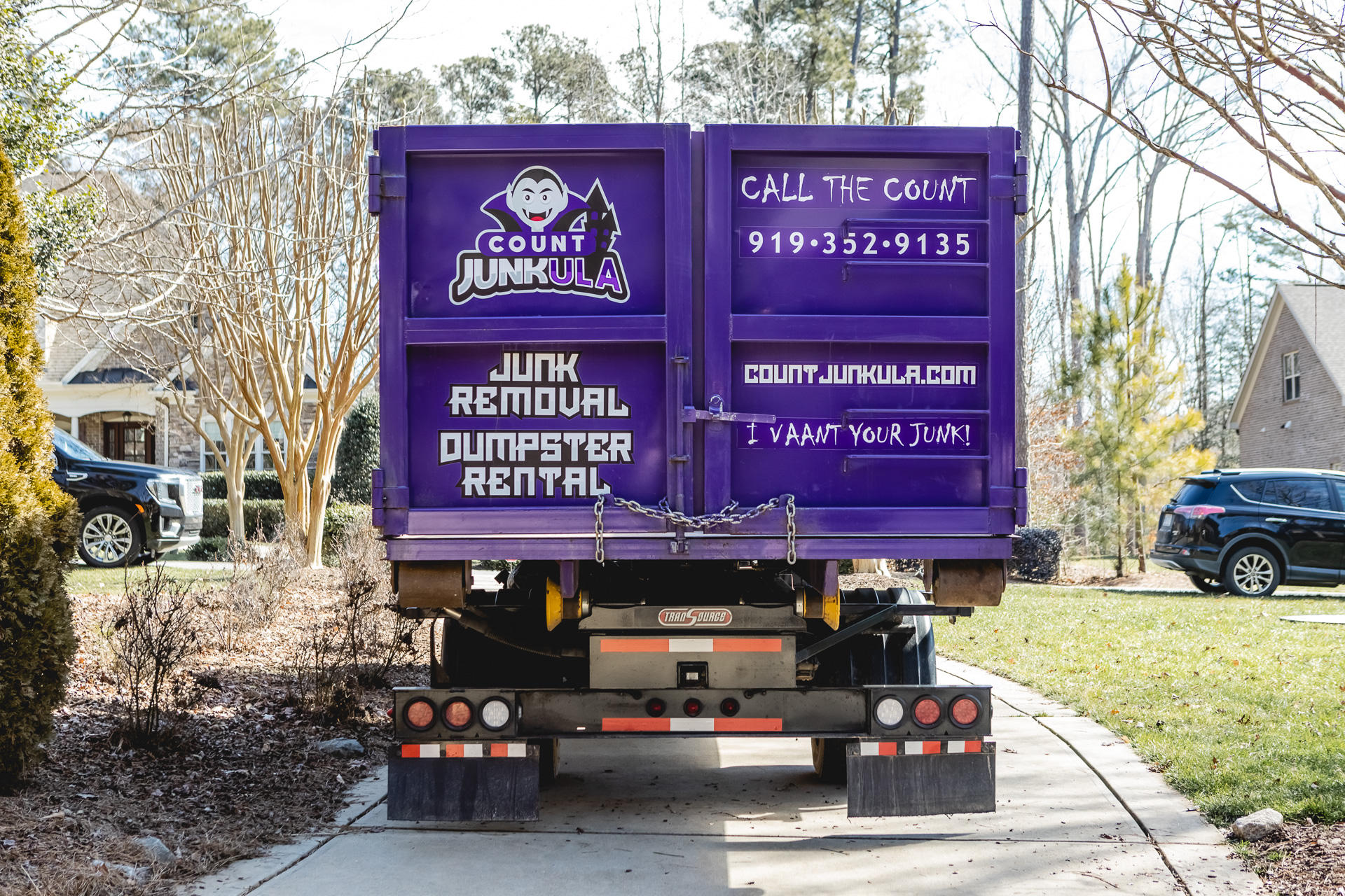 count junkula of raleigh junk removal truck rear profile shot