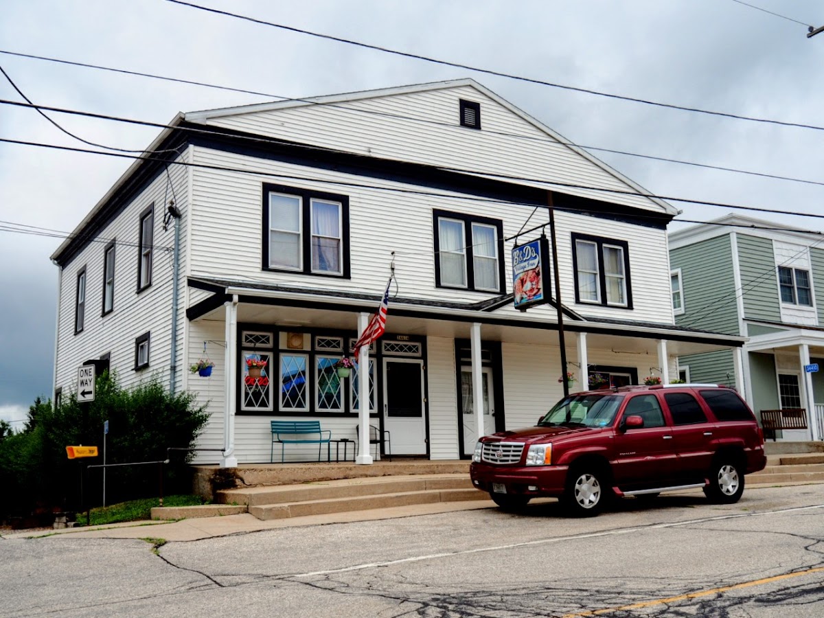 B&amp;D Village Inn Logo