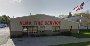 Alma Tire had its humble beginnings in the heart of old downtown Mt. Pleasant, MI. The building -constructed sometime in the 1930’s and originally known as Bill Murray’s Garage- was eventually purchased in part by Richard Grace and his wife, Mary in 1957. For a 25% stake in the business, they put up $2000 – their life’s savings – changed the name to Mt. Pleasant Tire Service and poured everything they had into making their new venture a success.