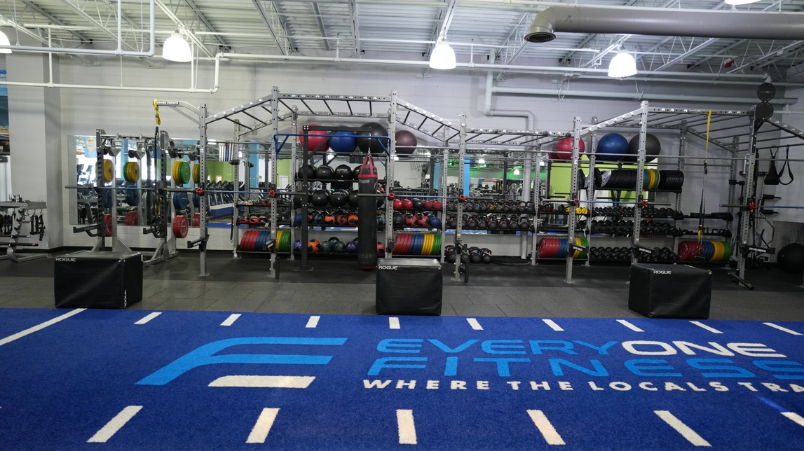 Performance turf area at Everyone Fitness Rehoboth Beach equipped for sled pushes, kettlebell work, and mobility drills.