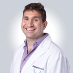 Joseph Dinnerstein, DDS, DMD Logo