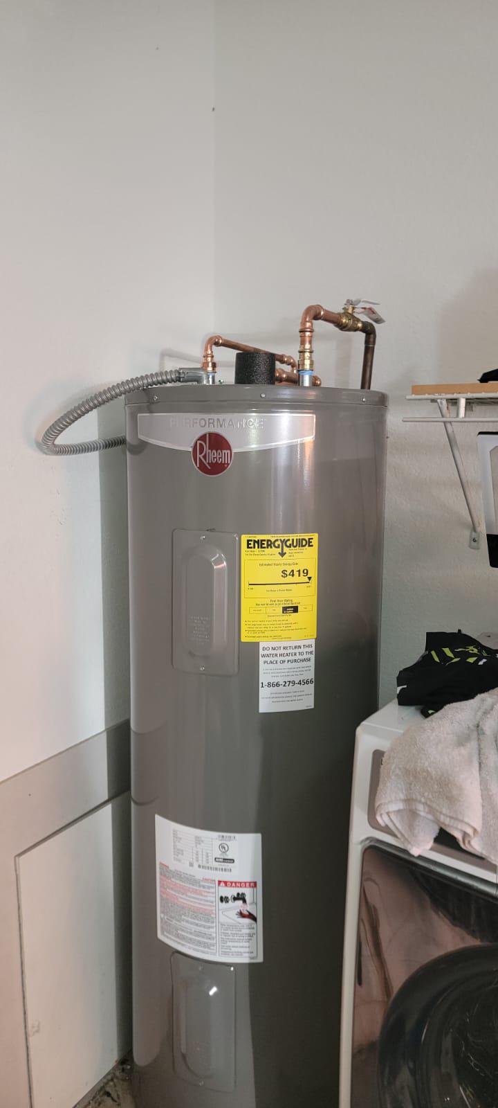 Installing a Rheem Water Heater in South Miami on 9739 SW 92nd Ter Miami, Florida 33186 - Miami 24/7 Plumbing