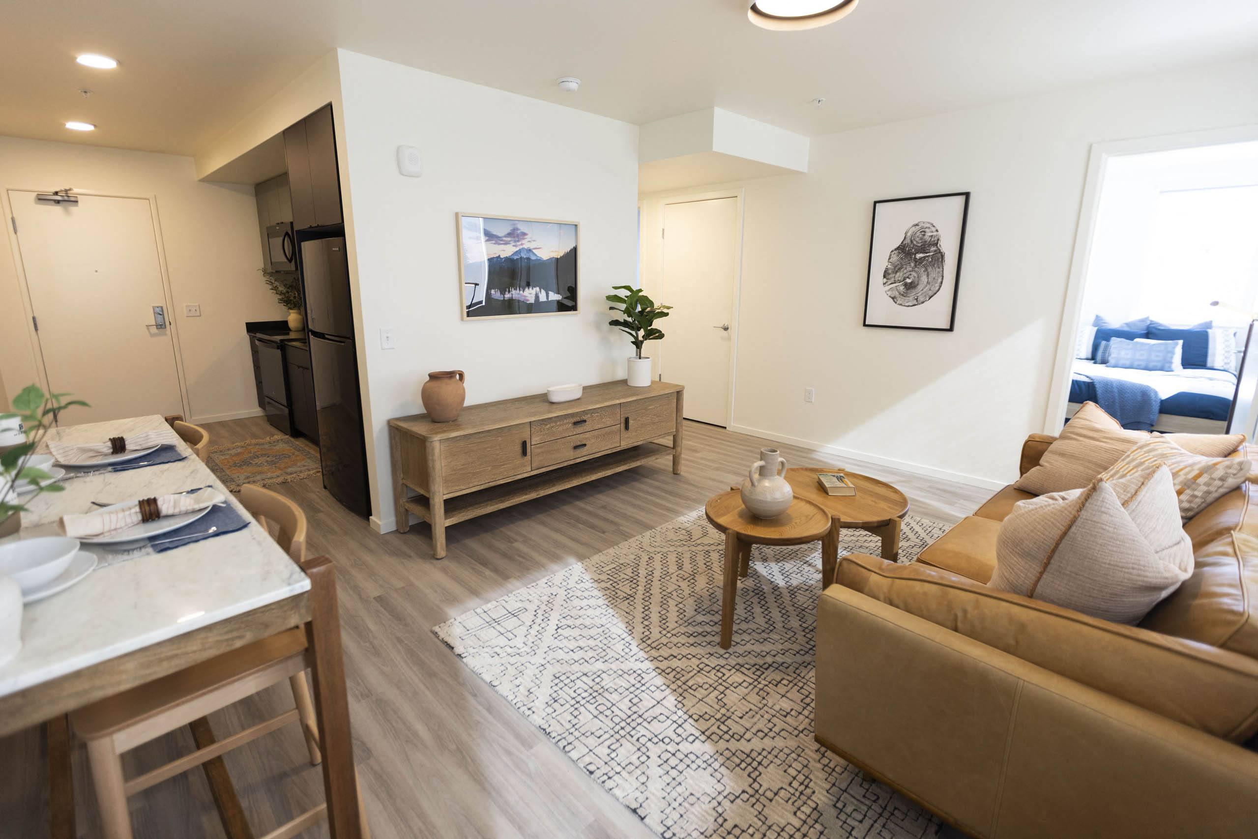 a living room with a couch and a table