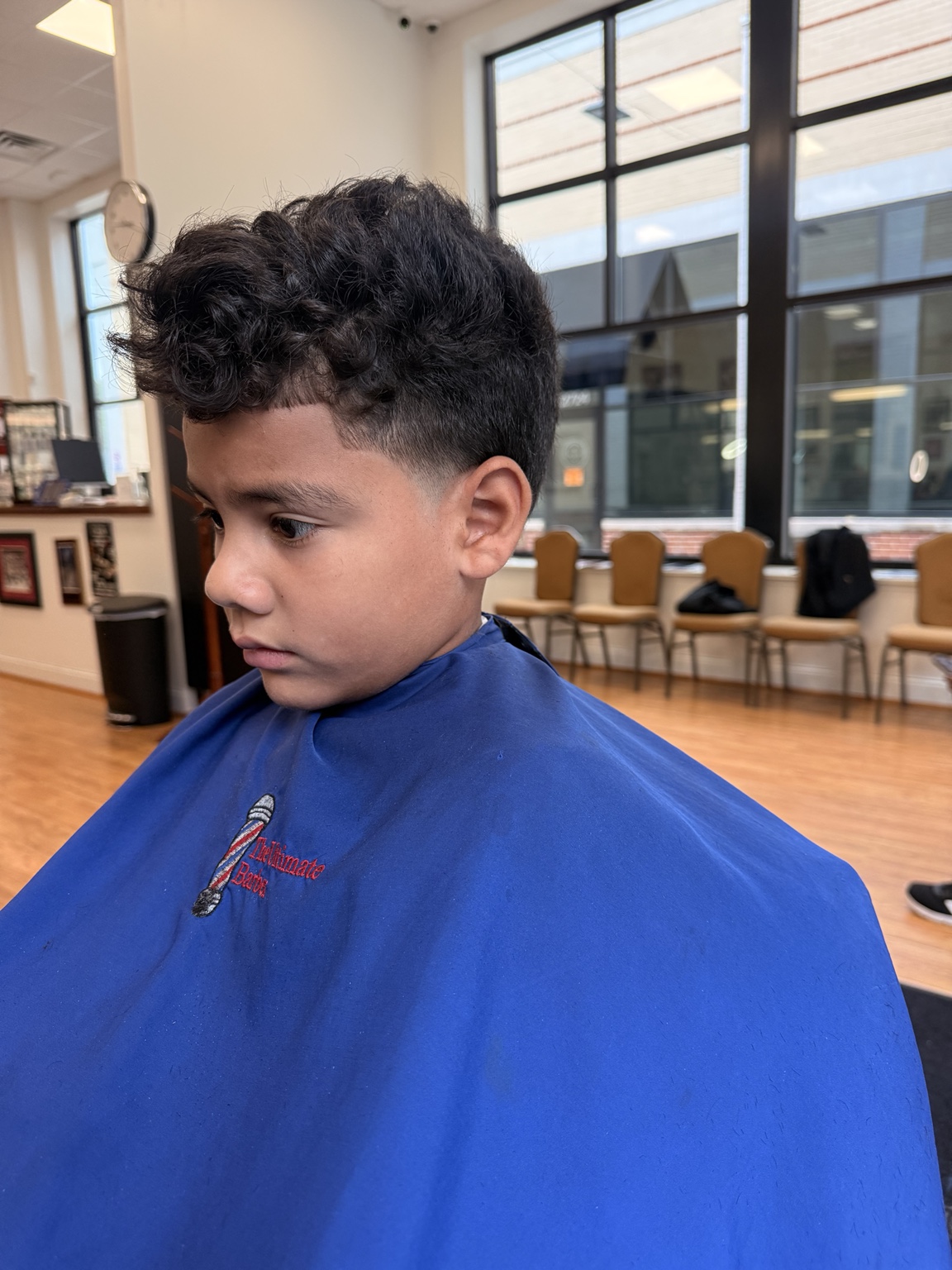 Kids' haircut at The Ultimate Barber in Alexandria, VA - opposite side view.