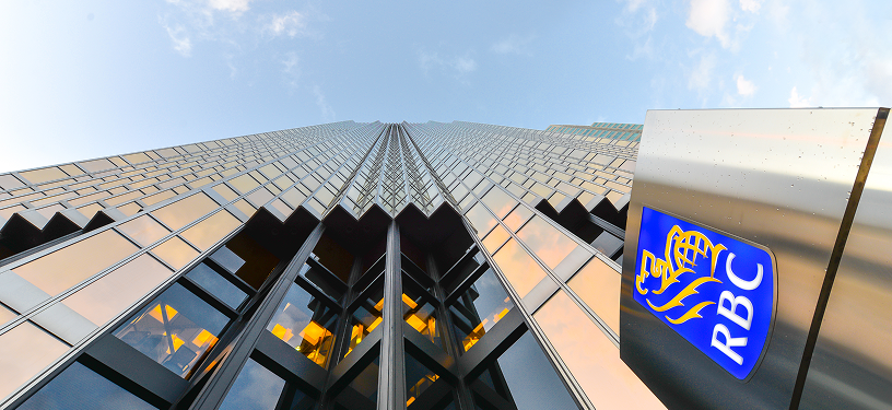 An office tower with the RBC logo, as seen from below.