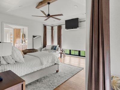 Layered Window Treatment Enlightened Styles Roller Shades and Carole Fabrics Drapery.