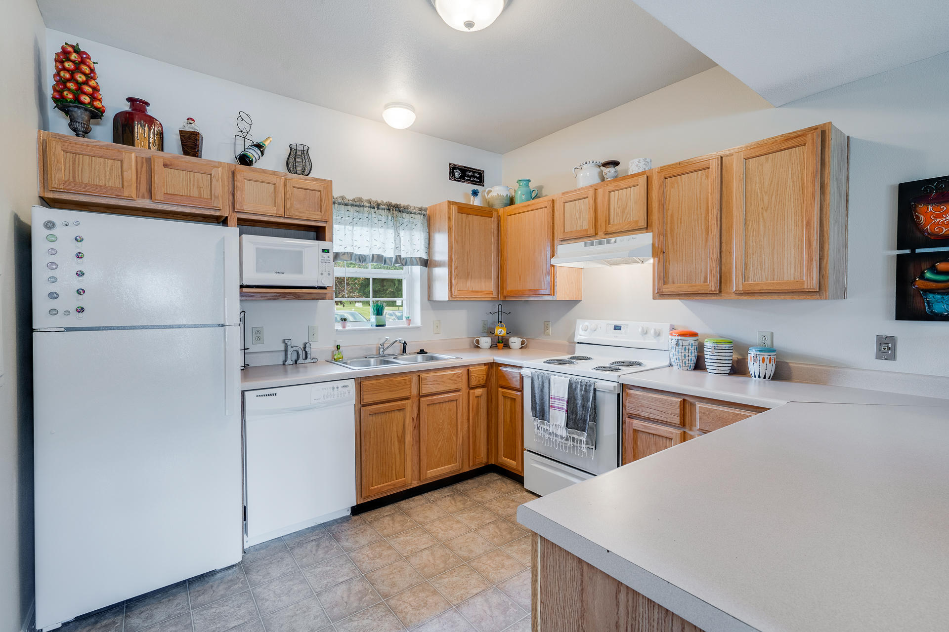 Fully-Equipped Kitchen With Window