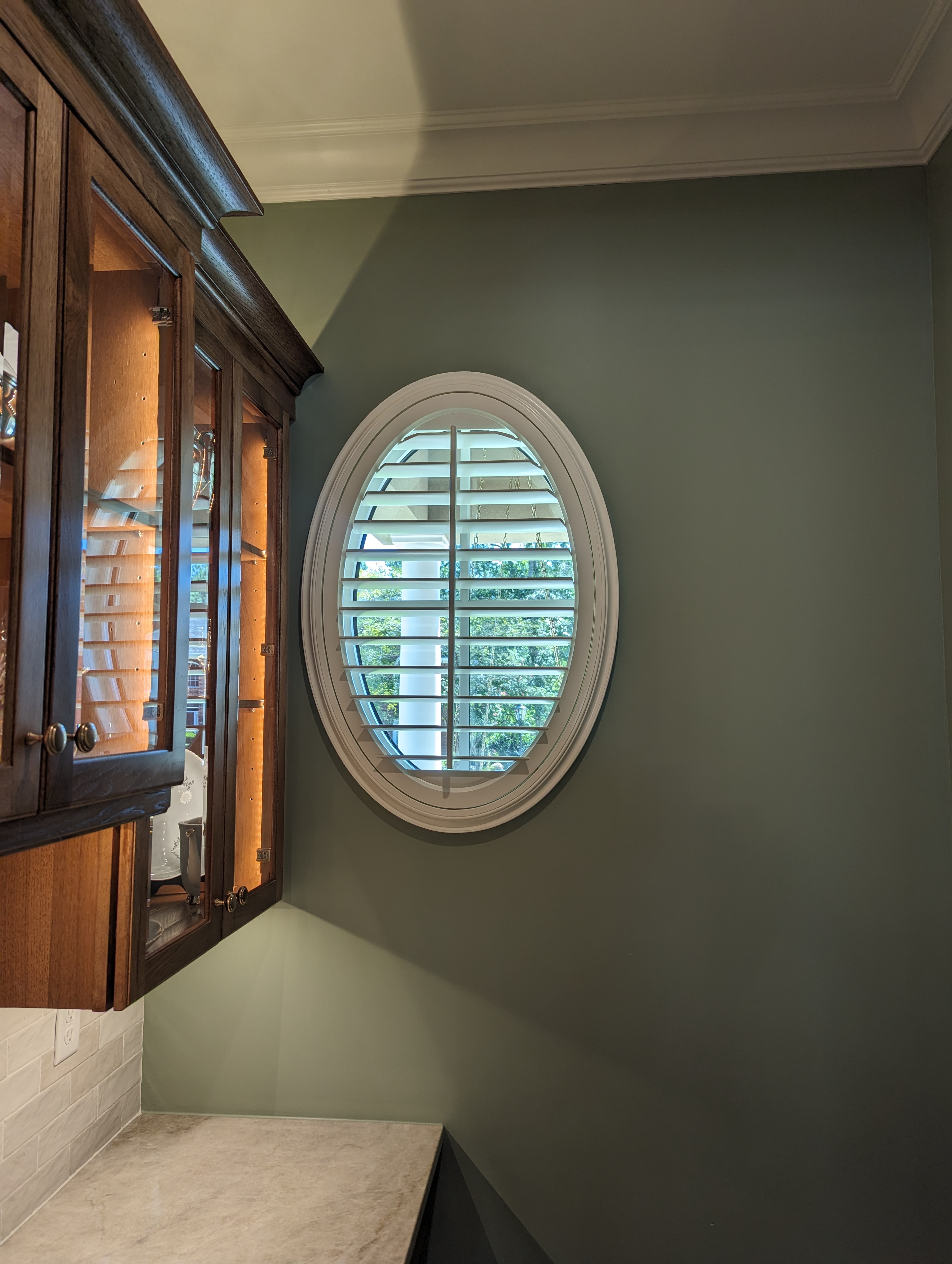 From Midtown to Spring Hill, an oval interior plantation shutter adds handcrafted warmth and a tailored finish to your windows. Enjoy real wood craftsmanship, custom fit, and in-home expertise from your local Budget Blinds team.