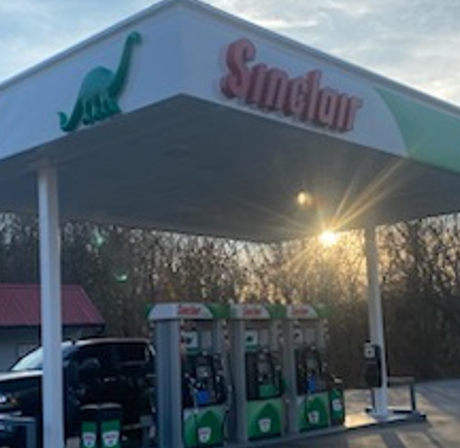 Sinclair gas station fueling island.