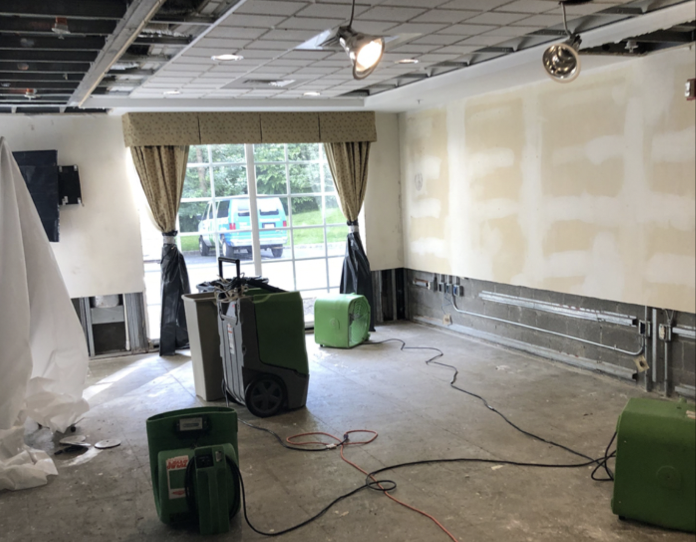 Water damage restoration equipment and recovery services by SERVPRO professionals, drying equipment and dehumidifiers to mitigate damages