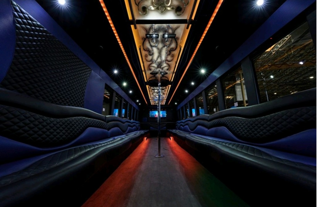 Las Vegas Party Bus 40+ Passenger Bus BIG Money Interior with bar and two dance poles and state of the art sound an lighting.