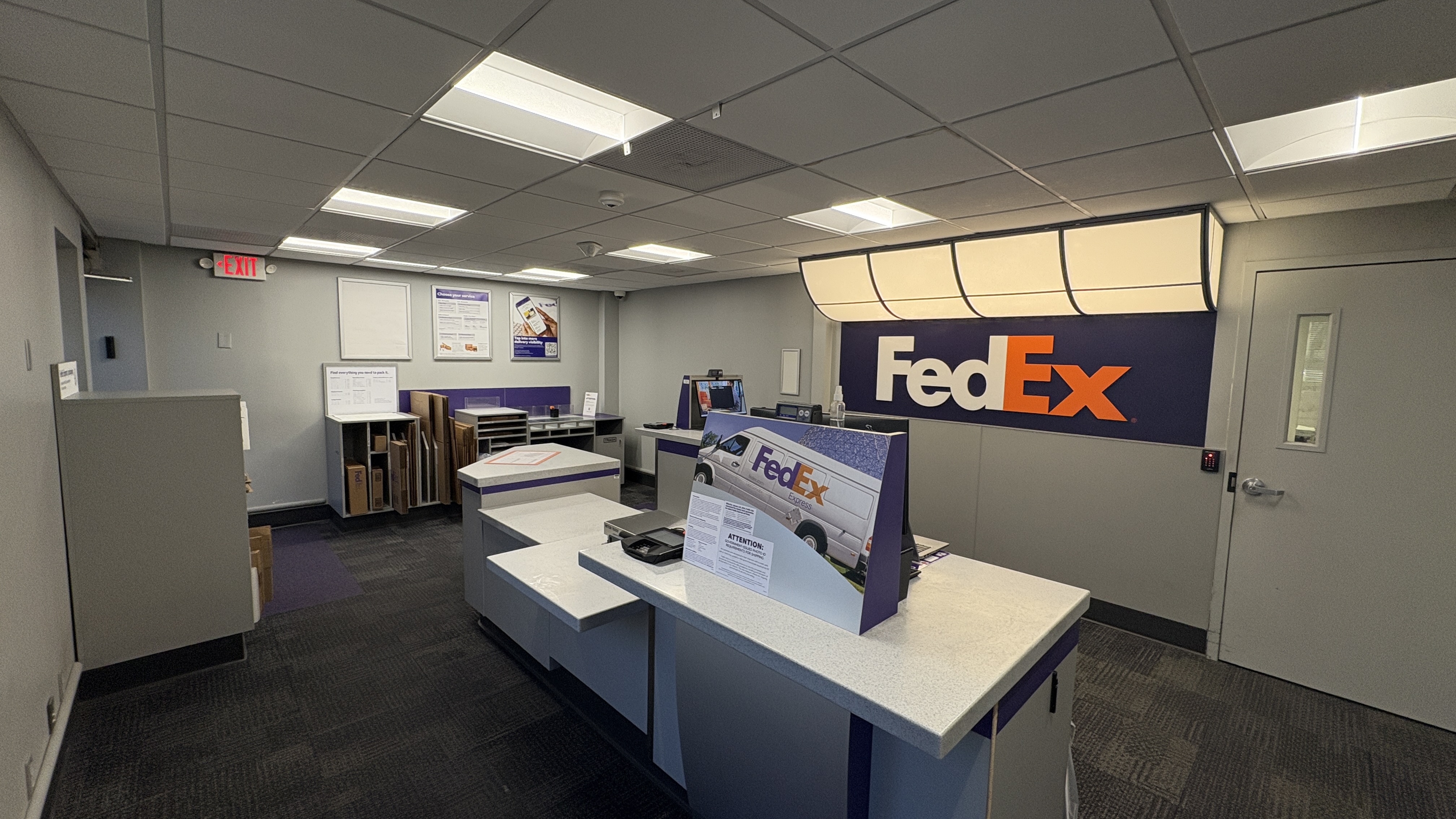 Shipping Counter and Service Area &ndash; Shipping service area at FedEx Ship Center in Lincoln Nebraska with workspace for processing packages and customer shipments.
