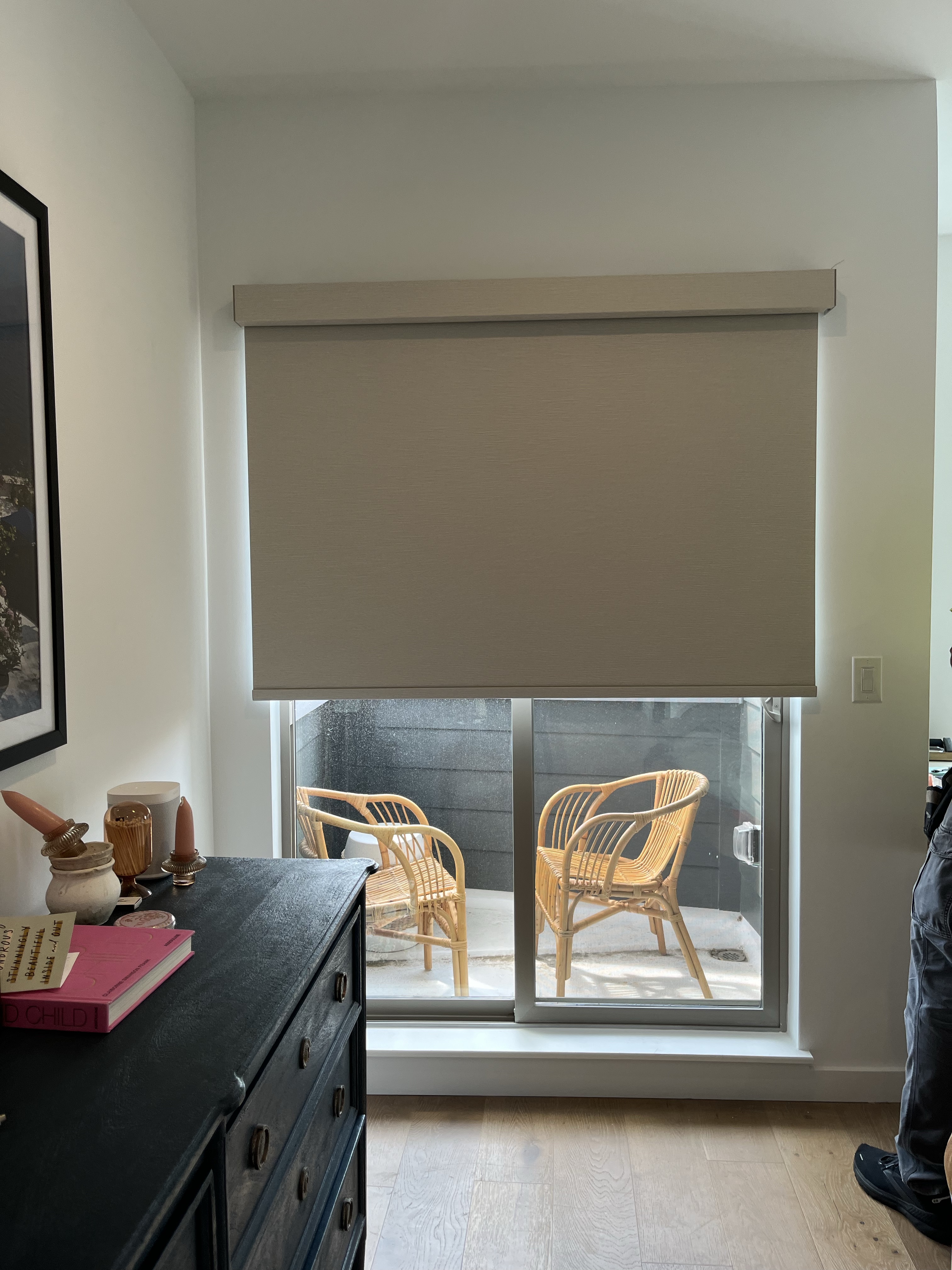 Motorized roller shade is a great option for sliding glass doors.