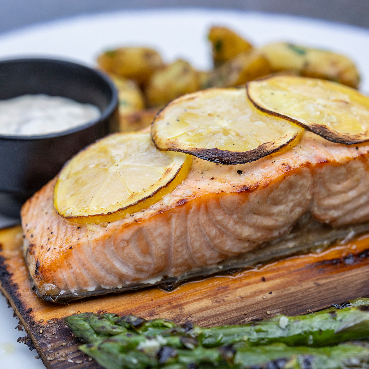 Cedar Plank Salmon | roasted yukon gold potatoes, asparagus & lemon garlic aioli