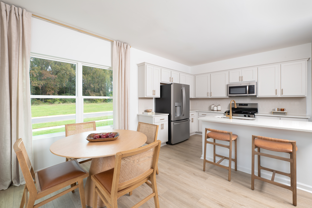 Towns at the Point by Ashton Woods Logo