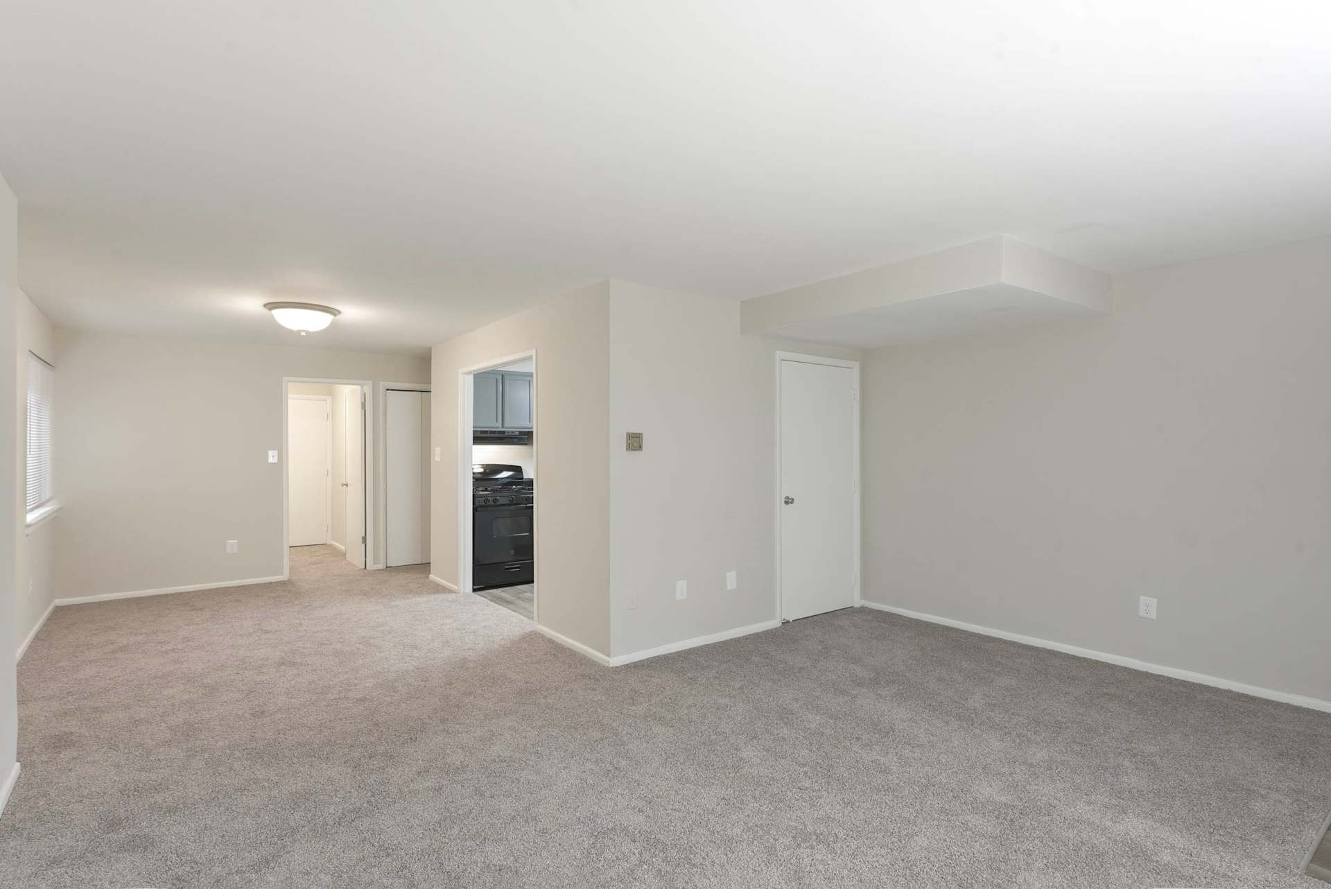 Interior living room with plush carpeting.