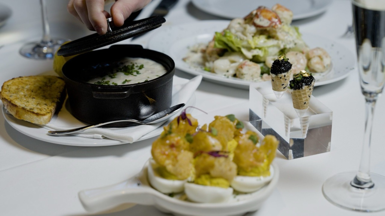 Seafood appetizers with soup and salad sides