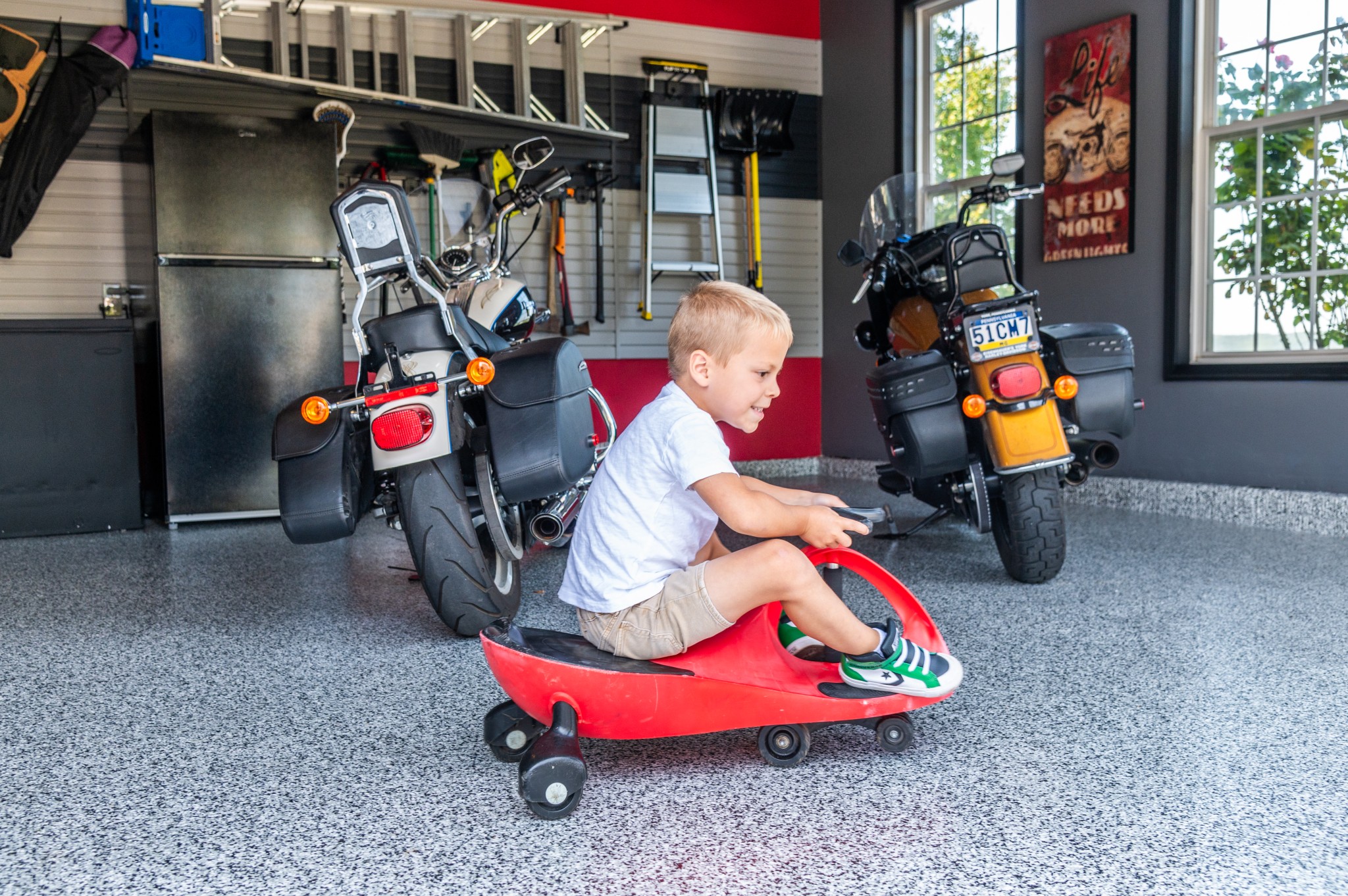 Playtime is more fun on a polyaspartic epoxy floor! Get the floor, and garage, you’ve been dreaming about by contacting PremierGarage of Lancaster today.