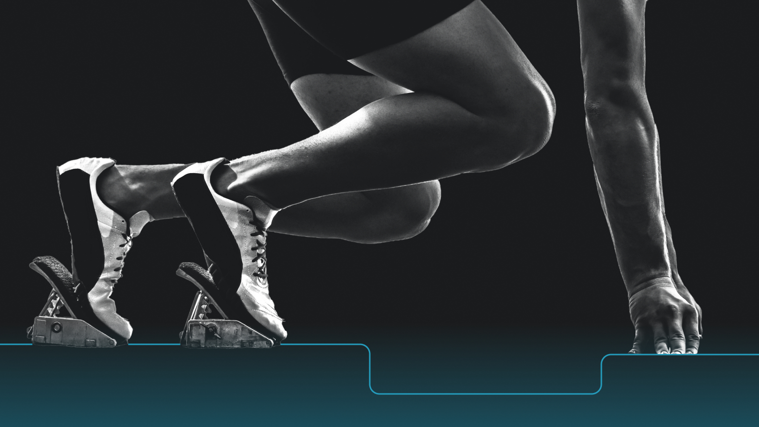 Runner crouched down at the starting line, ready to run