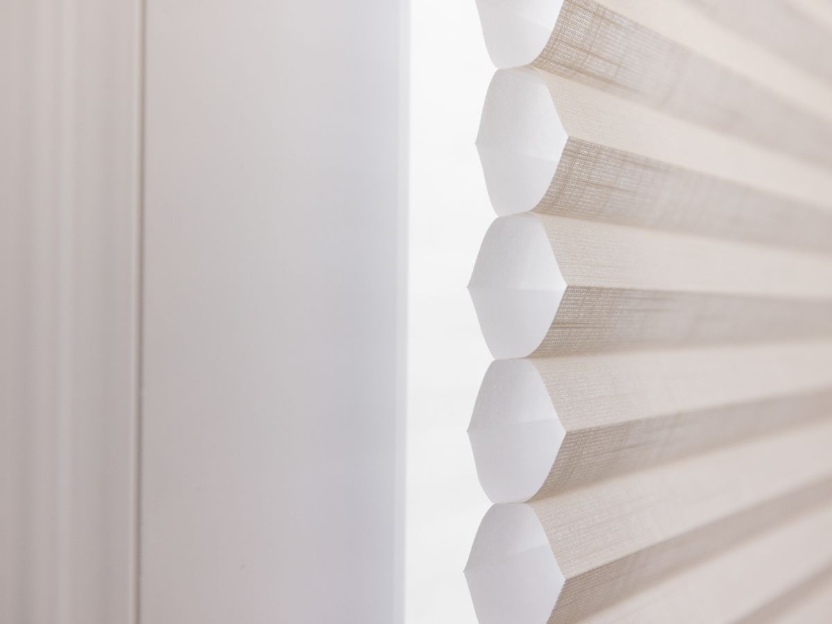 Experience the perfect balance of  comfort and energy efficiency. Our Cellular Shades feature honeycomb-shaped cells  that trap air, providing a layer of insulation that keeps your room cozy in the winter and  cool in the summer.