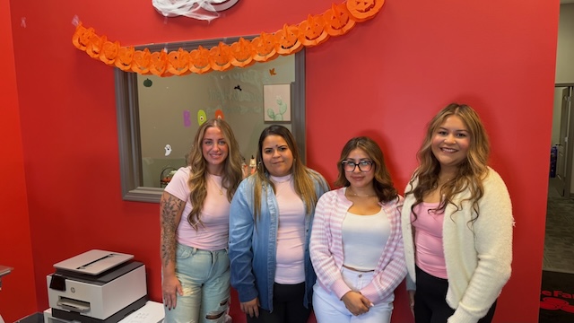 Wearing pink in honor of Breast Cancer Awareness Month