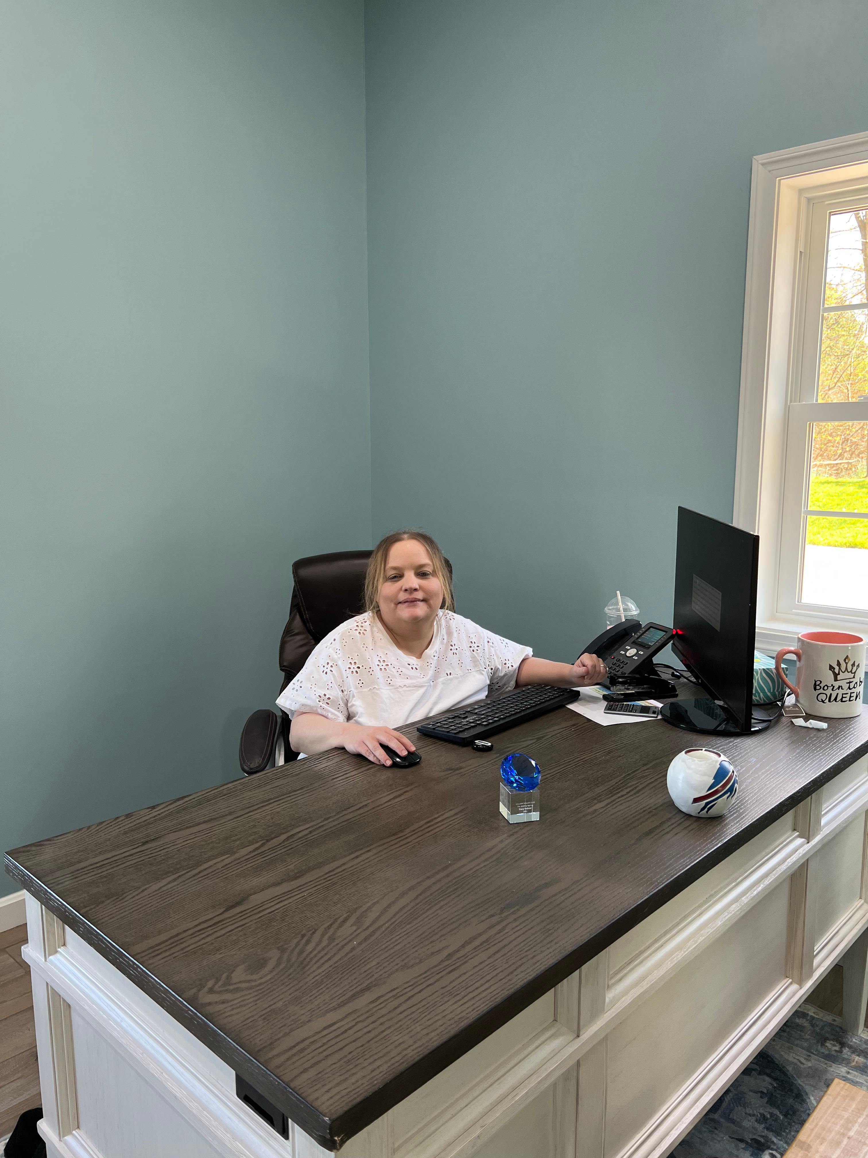 Tracy at her desk