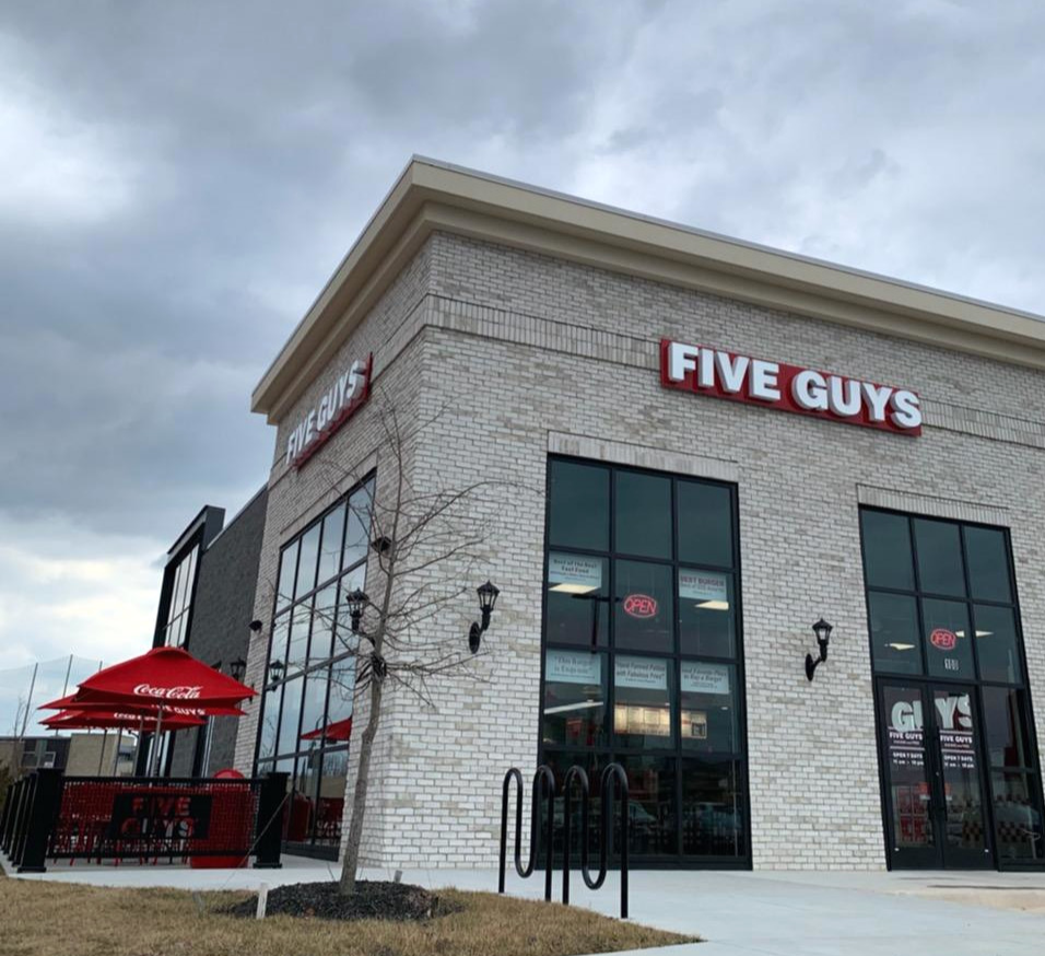 Exterior photograph of the Five Guys restaurant at 44795 Dulles Overlook Drive in Ashburn, Virginia.