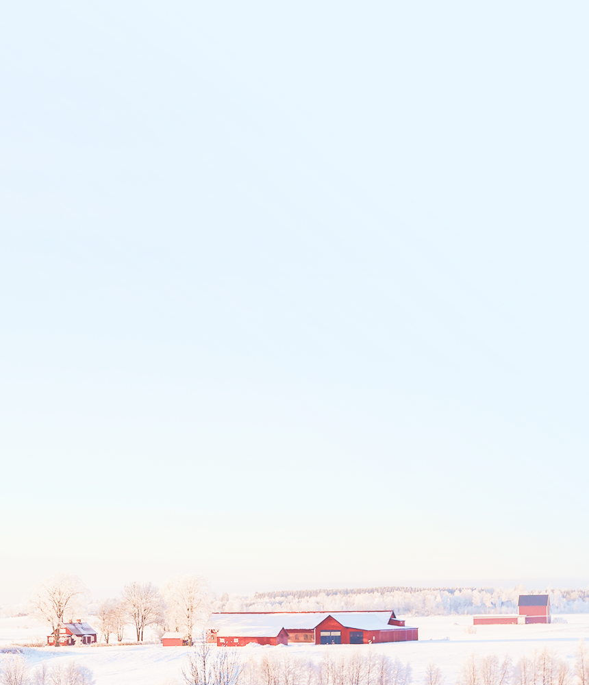 A farm in a snowy field.