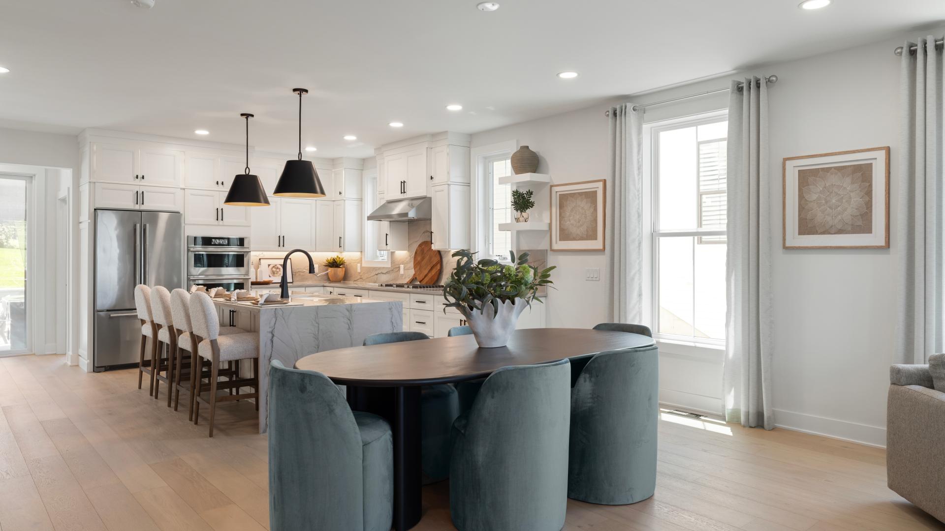 Kitchen overlooks casual dining area