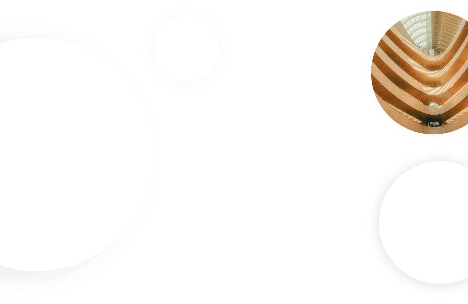 Architectural interior of a library's interior, looking up at a skylight.