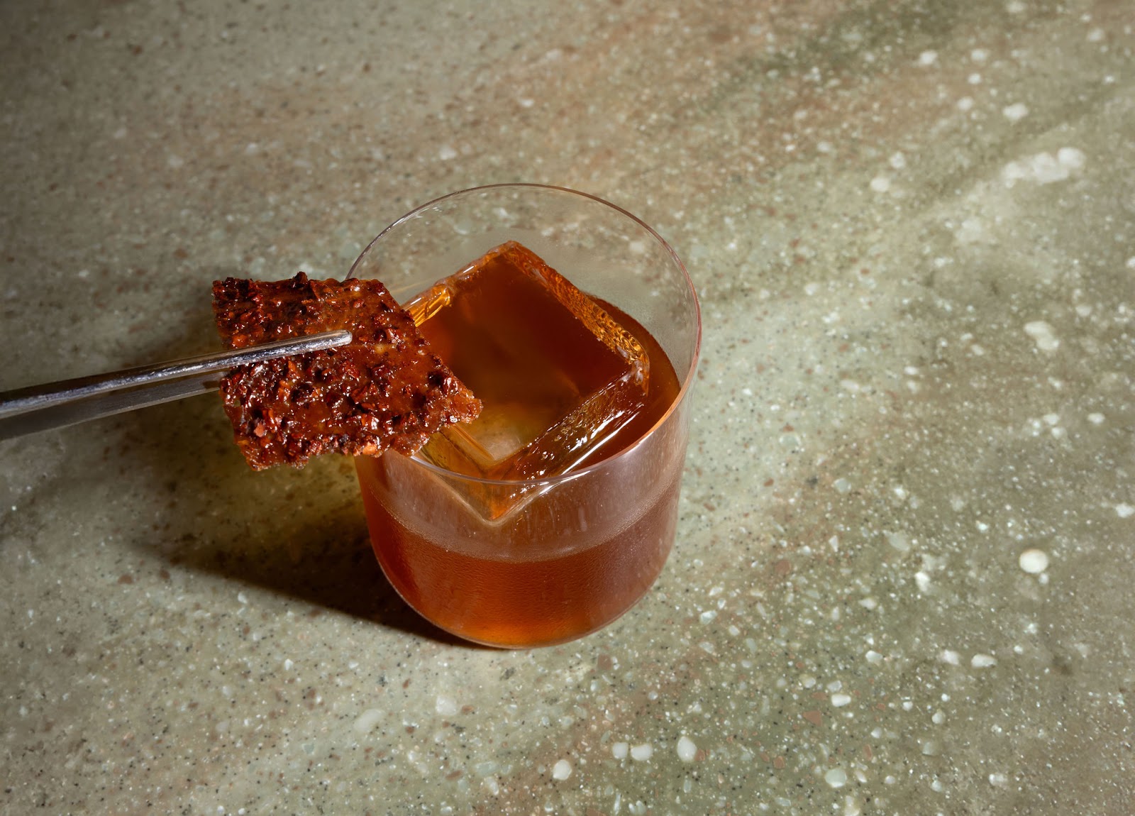 A smoked cocktail from the Markette bar program. Served in the dining room in Chelsea, Manhattan.