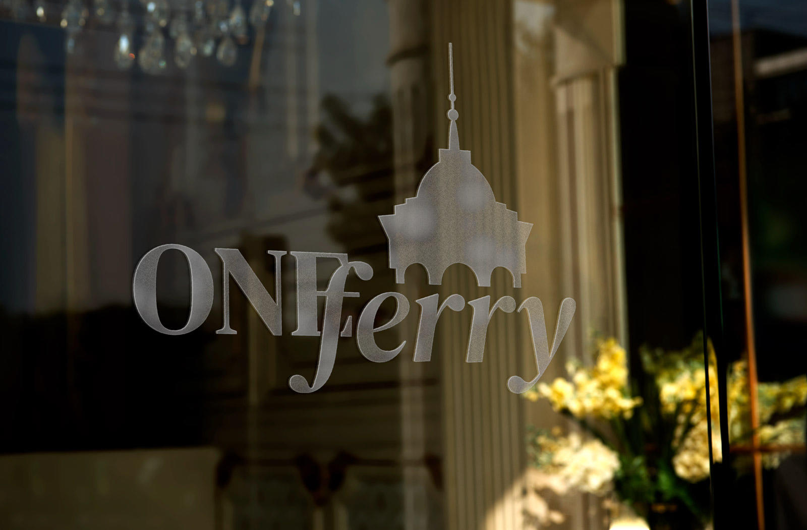 Detail of One Ferry Project Logo on window