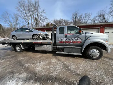 Images Tom Coop LLC Towing and Recovery