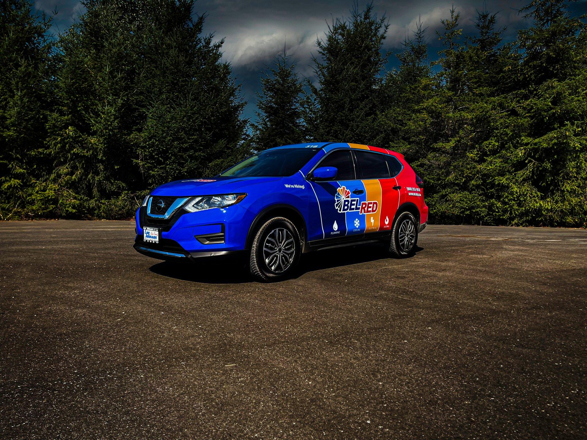 Full SUV wrap for BelRed on a Nissan Rogue, turning a service vehicle into a bold rolling billboard.