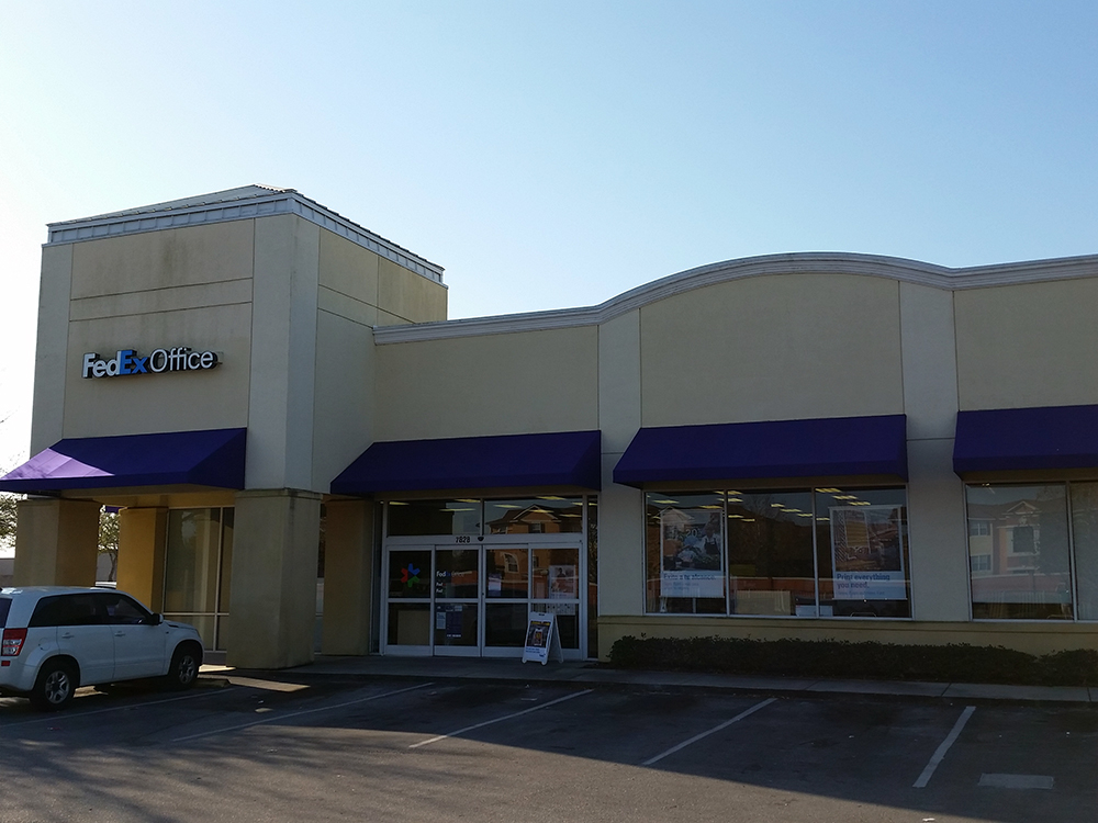 Exterior photo of FedEx Office location at 7828 W Colonial Dr\t Print quickly and easily in the self FedEx Office Print & Ship Center Orlando (407)523-0202