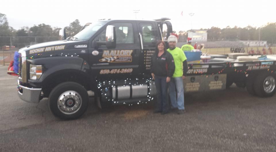 Even though we met by accident, we’ll treat you like a friend! Our services come from our expertise with towing and recovering light, medium, and heavy duty vehicles for over 16 years now. Why trust your vehicle needs to anyone else?

Our drivers are certified through NATA & also PWOF. We are open for business 24 hours a day 7 days a week because we realize that the need for a tow or recovery does not always occur during regular business hours. We offer to tow and recover all light, medium, and heavy duty vehicles. You can trust our experience because we’ve been in business for 16 years offering prompt and courteous service. Our services include fuel delivery, jumpstarts, lockouts, and tire changes through our Towing Service and Roadside Assistance services. We are here to serve our law enforcement, most major motor clubs with our local and long distance towing of light, medium, and heavy duty vehicles.