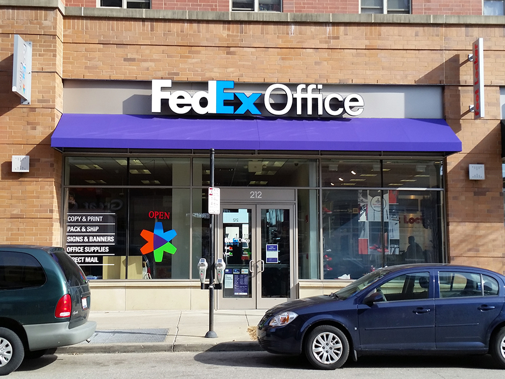 Exterior photo of FedEx Office location at 212 Calhoun St\t Print quickly and easily in the self-service area at the FedEx Office location 212 Calhoun St from email, USB, or the cloud\t FedEx Office Print & Go near 212 Calhoun St\t Shipping boxes and packing services available at FedEx Office 212 Calhoun St\t Get banners, signs, posters and prints at FedEx Office 212 Calhoun St\t Full service printing and packing at FedEx Office 212 Calhoun St\t Drop off FedEx packages near 212 Calhoun St\t FedEx shipping near 212 Calhoun St