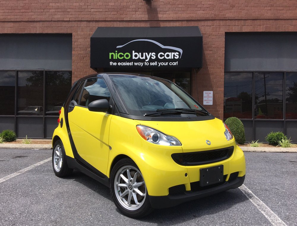 Nico Buys Cars Storefront.