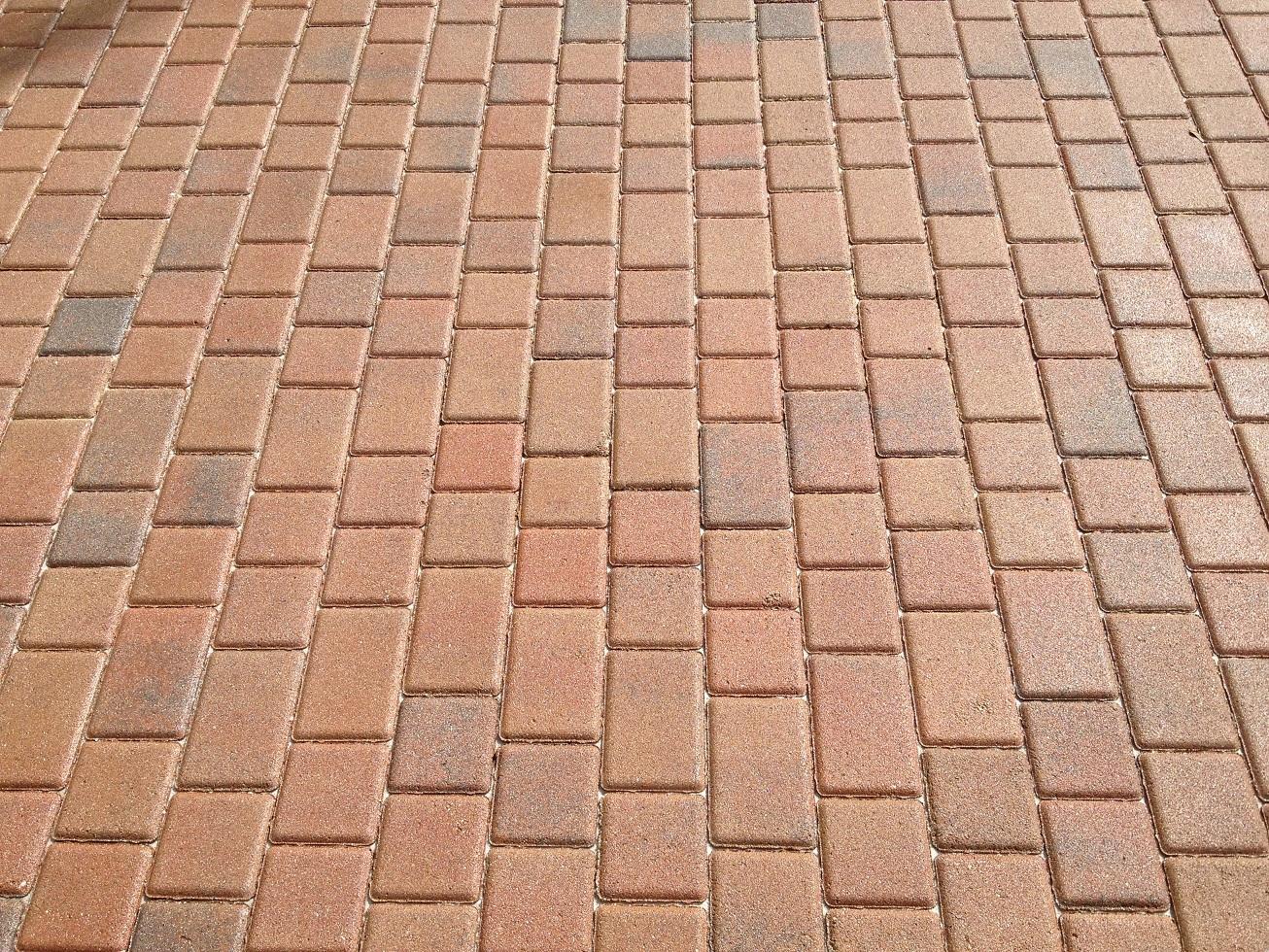 Brick Pavers after we acid washed, cleaned, sanded and sealed.