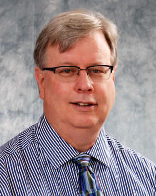 Bruce M Graham