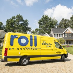 Roll by Goodyear Van Pulling into a Driveway to Perform a Tire Installation.