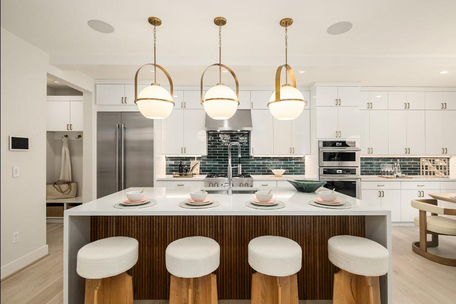 The Alki kitchen offers a convenient center island with breakfast bar