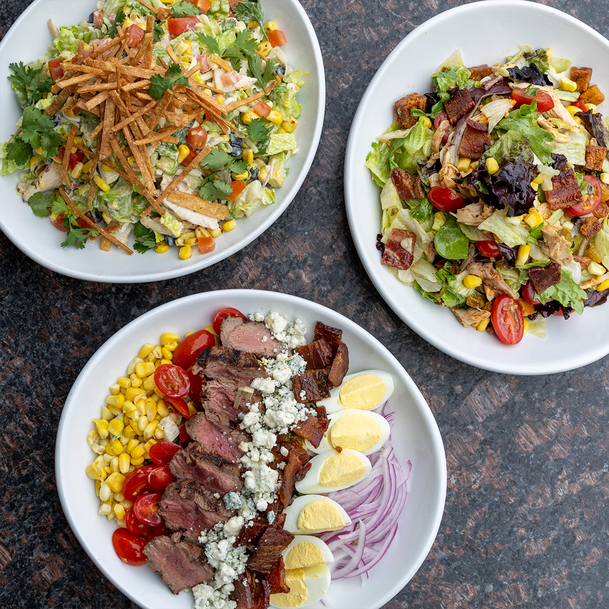 Salads featuring Rotisserie Chicken Chopped, Southwest Grilled Chicken & Filet Mignon Cobb