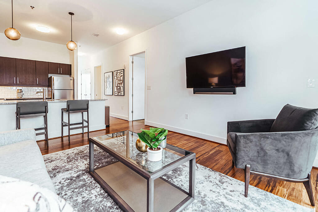 Open concept living area with kitchen breakfast bar
