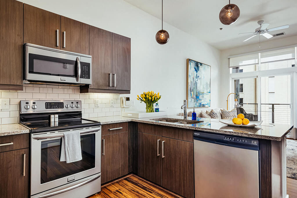 Kitchen with wood cabinetry and granite countertops