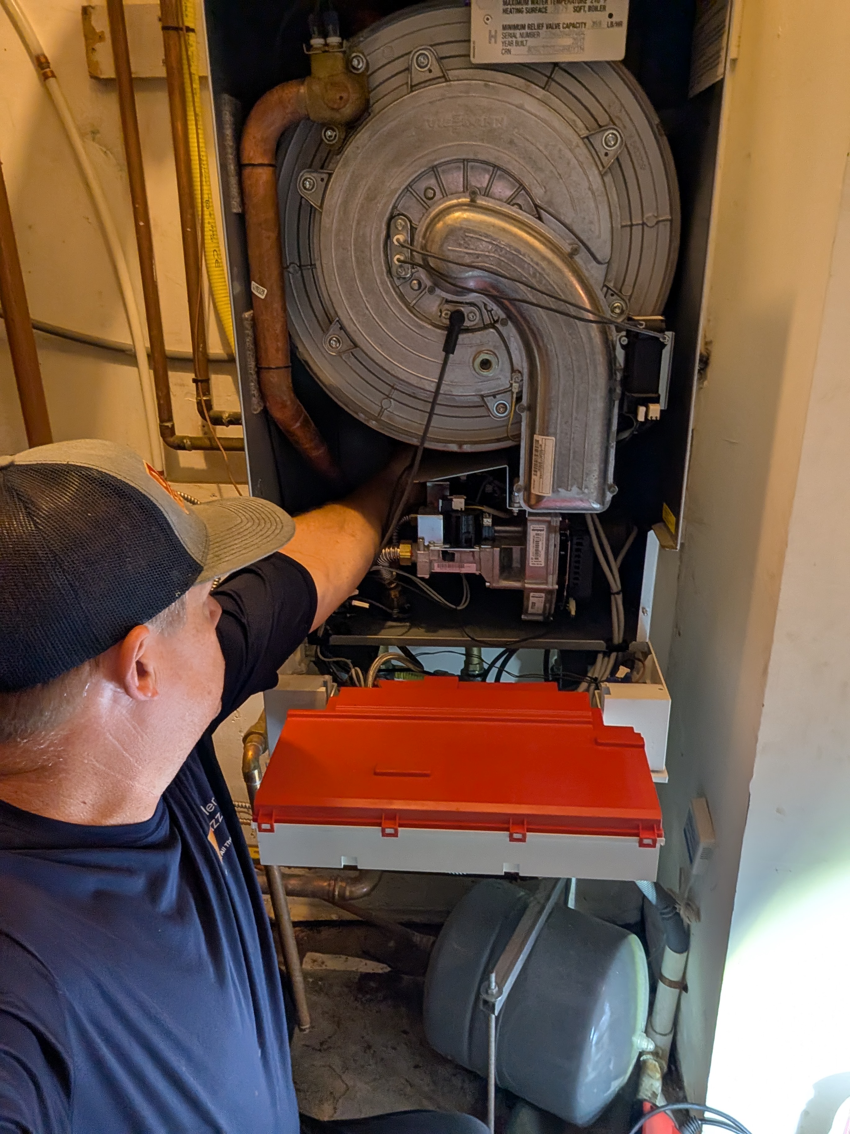 performing a routine maintenance on a Viessemann boiler 